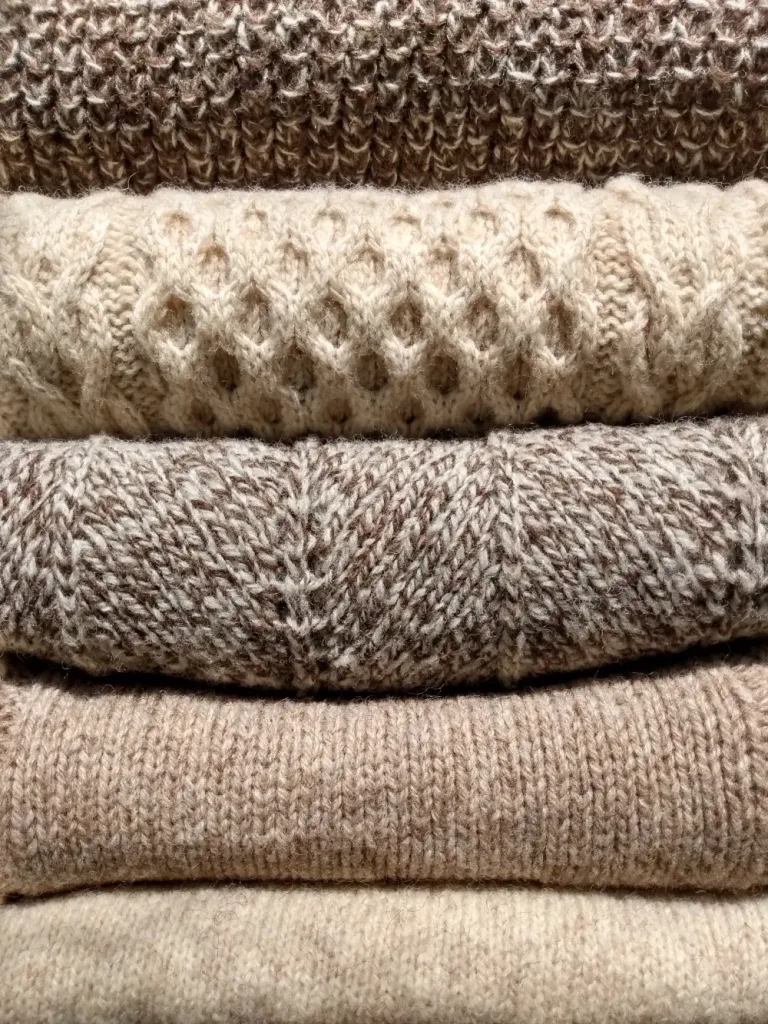 pile de pulls en laine
